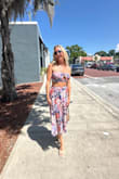 Absolutely love it! The colors and the flower print are great for summer and vacation vibes. Love that the skirt has a hook and zipper to keep skirt on and elastic for a bit of stretch. The top has a surprisingly cut to show a little under side boob. Very sexy. Yet subtle for church with a sweater, perhaps. 10/10 for me - Amanda C.
