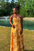 The fit of this dress was true to size for me, and the material was not heavy. I honestly felt like I was floating when I walked. The side pockets!? Omg. I loved them, and I could keep the little things that I brought with me. I received a lot of compliments about this dress, and I loved wearing it as a wedding guest for my friend's wedding. I highly recommend it - Jaelyn A.