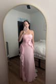I wore this dress to my sorority formal, and I got so many compliments. It really is stunning! The material is so nice, and this dress flows so beautifully when I walk. Looks so expensive, and the quality is seriously amazing. I listened to the other reviews, and if you're between sizes, I'd say size up. I am a size small in most tops and dresses and a size medium in bottoms. I got a medium in this dress, and I adore it! I will be re-wearing this to a wedding next year. I'd also like to mention that this dress is for tall girls because I am 5'8 and 5'10-11ish in my heels, and the dress almost touched the ground. - Avery J.