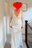 This was a beautiful dress.  The detail is stunning.  I did find the large fit me around my hips, but too big in the bust area. Ultimately, this wasn't the one for me, but I'd recommend it. - Kari H.