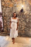 I absolutely love this dress. I got so many compliments on it. It's comfortable. The material is light and it fits my frame perfectly. - Aja N.