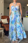 It's cute, I can usually do a medium or large depending on the style, since this was a looser style I went for a medium and it does fit but there is no stretch to it so it's a little snug in my back but other then that fits cute. - Annslee W.