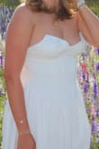 I bought this dress for my sorority's formal event. The dress itself was cute if a little tight, but the cups were WAYYYYY too big. I tried taping them down in multiple different spots, but no matter where I taped them, the cups stuck out in some way or another. Overall, cute though. - Kate G.