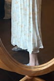 I returned this because the bottom hem was super uneven. The fit was small and not flowy like I expected. - Katelyn D.