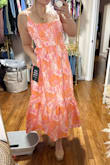 Super cute on, love the vibrant colors, and the midi length always seems to be the best for my height! The top looks like it has a little extra material, but I would not size down. - Kristin L.