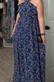 The dress is really pretty and has a lovely flowy vibe. I also really liked the top of the dress. I ordered it in blue and the color was very nice for a nighttime wedding.
Unfortunately, I had to return the dress because I could not get the zipper to go past the band under the bust. I ordered a size large and the zipper would have fit however, it just was not going to go beyond the waistband. There is no give in the empire waistband and we were afraid of breaking the zipper if we forced it beyond that band. Because of that I had to return the dress. - Robin M.