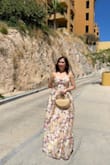 This dress is stunning, elegant, flattering, and beautifully detailed. The fit hugs in all the right places while still flowing effortlessly, making it both comfortable and sophisticated. The floral design adds a soft, romantic touch that feels timeless. Perfect for special occasions or when you want to feel effortlessly chic. Highly recommend! - Roselle Y.