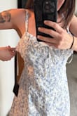Wanted to love this dress! The fabric was very cute and high quality. Unfortunately the chest area was cut very large. Even adjusting the straps did nothing to help it. I am a D and it was gaping. It could definitely be altered but I don't have the time before vacation. I don't think sizing down would have helped either unfortunately because the rest of the dress fit fine. - Hannah S.