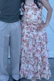 It was a bit long but I got it hemmed. It is a beautiful dress and fits wonderfully. I recommend sizing up if you have a bigger chest. - Jocelyn M.