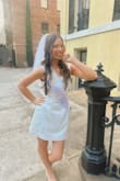 I loved this dress on me!! Fit like a glove, and gave such a flattering hourglass shape even though I am on the not so curvy side. The fabric did not feel cheap, and the bow added the cutest detail to the back of the dress. Buy it! - Tori M.