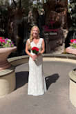 I wore this dress for my Las Vegas elopement, and it was the perfect dress for the occasion. Slightly stretchy, but also so delicate and elegant. The train length was easy to manage, and the dress was comfortable enough to wear all day and night. The ivory color worked really well with my fair skin. The dress is very long, so I had it hemmed 3" and had a bustle added (5'4 with 2.5 heels) - Samantha M.
