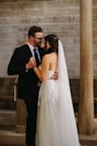 I loved this veil for my wedding day, and it's such a good price! It was beautiful in photos and didn't feel too heavy. Great quality. I'm 5'8 and wore 4" heels. It dragged the floor slightly, just like my dress. It was perfect - Ashley D.