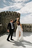 I absolutely loved my wedding dress. I love that it ties in the back so it fits like a glove and the detailing around the open back is very pretty in photos. I love an A line style. It was a statement look without being heavy. I would choose this dress again and again - Ashley D.