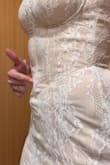 The dress is very cute. Typically, between an xs & a small and an xs was even a little big on me. Not sure if it was just an error in manufacturing but the bottom of the corset bubbled outwards so it would look to silly to wear to an event. (can't see it very well in the photo because I'm pushing it in). very comfortable dress, lots of stretch. Unfortunately, due to the bubbled out corset and it being to large in the bust, I had to return. I am 5'7 and it was a tad long, but we could work with that!! - Anna S.
