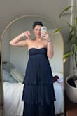 Beautiful dress, just be cautious if you're more well endowed in the bust area, as this will run small! Wish it could've fit the chest area since it is super flattering. Will be returning. - Emma J.