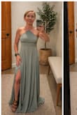 This dress is so beautiful and flattering! The dress is quality material. It is a little bit thicker which I like because it feels like a higher end dress. I absolutely love the color of this dress, and it will be worn as a guest at a beach wedding. It is obviously quite long, so I have to get it hemmed as I'm only 4'11.5. For you athletic girlies, it definitely accentuates your muscles - Candace V.
