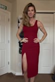 I ended up wearing this dress for Valentine's Day. The fit is true to size and I love the interesting back. The front slit is a little high so I was aware of it as I was sitting down. That's the only thing I would change if able. - Becky H.