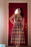 38d, 27-28 waist, I loved how unique this dress was. The info said no stretch, but since I fell between sizes, I got a small. And that wouldn't zip where my waist was. So I got a Medium, here are photos of me in the medium. I still had room in the waist; the sides of the halter are big, so I would have to pin them. The dress was loose all over, so I kept both. And decided to lose a few pounds to fit the small. - Debra B.