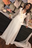 I wore it to my bridal shower and got tons of compliments on it. I was a little long. I would recommend getting the dress hemmed if you're on the shorter side. - Claritza A.