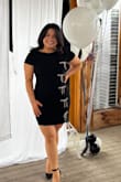 I loved this dress! It fit so nicely and I received so many compliments on it! The bow detailing is a lot nicer than most, they are pretty heavy. I do recommend bringing it to the dry cleaners and having them hand wash or hand washing at home. The only other thing is this is a pretty short dress, I am 4'11 and when I sat, it rode up a decent amount. - Ashley F.