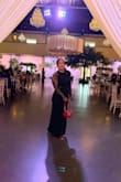Runs a tad bit large and tailored it minimally to get a perfect fit. Love that I can wear heels or boots with it - Roxanne A.