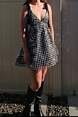 I was worried it might run small, so I ordered the medium. The medium was too big, so I sized down to a small. I absolutely love the dress! - Audrey K.