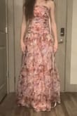 I love the dress visually! It's definitely a bit too loose, and the dress is about an inch or so longer than expected. I will need to get it hemmed, but the fabric is high quality, and the style is just what I was looking for! - Reagan T.
