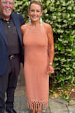 This dress is fantastic. If you want to stand out, just a little bit, then this is the dress for that. I normally wear a size small, but I didn't want to be uncomfortable for this wedding, so I ordered a M. If I had ordered the small, I think that there was enough stretch that it would have been fine. Either size, I would have been happy. Stunning, Flirty, Fun, Loads of compliments. - Shannon K.