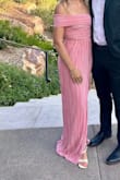 Bought this dress for a black tie wedding and absolutely loved it! Very comfortable and easy to move in! I'm 5'5 and wearing just a little heel, so the dress was a little long but not too long to need altering. I received so many compliments on this dress and would love to wear it again! - Christina R.