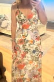 This dress is stunning. It's a simple style with a gorgeous print. It's prettier in person. I ordered a small because I'm curvier on the bottom. 5'3 128lbs - I exchanged it for an XS, and it's like a glove! Just buy it!!! - Paige T.