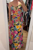 This dress is so pretty. It is very long, so I will need to have it hemmed. I'm 5'3 128 lbs, and I typically wear a small. This doesn't even look like a two piece on me, but I still like it enough to keep it! - Paige T.