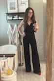 I absolutely LOVE this jumpsuit! Super comfortable, fits like a glove, and the wiring in the top helps hold its shape and keep it in place. I did have to hem it about 2 inches, even with 4in heels, so it's tall girl friendly. I want it in every color! - Jamie C.