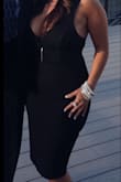 The fit was perfect and the quality of the material was incredible! Material was thick enough to smooth my extra (lol) but had just enough stretch so that it was comfortable to wear for hours! My all time favorite "little black dress" purchase! - Velvet C.