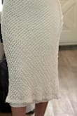 Fabric is a bit weird, it's quite thin and flimsy. The liner is longer than the outer layer. - Jessica K.