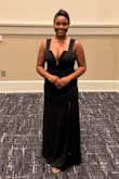 Fit perfectly for me. I normally wear a 34D and size 8/10 in pants! Material is nice and has some stretch. - Eryshia W.