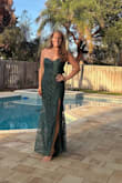 This dress is stunning in the right size.  It runs small so size up.  But I absolutely love it!! I'm just getting the train altered since it's long. - Jaclyn S.