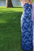 This dress was very flattering on my athletic build daughter. She felt like it gave her curves, and she was happy. We originally ordered a small and couldn't zip it up. Bust was really small. She is a size 4 in most tops/dresses. We exchanged for the medium, which did fit, but she kept pulling it up all night, so she needed something in between a small and medium. We opted not to do alterations, so all in all, a great dress at a great price. The flowers have a nice metallic look, which makes the dress look more expensive. A great buy! - Trisha R.