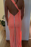 It is a beautiful dress. Different and sexy. The fabric is different from what I imagined. It's kind of lycra, but it really looks good. - Claudia S.