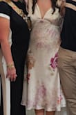 I was hesitant to get this since there weren't many reviews, but so glad I did. I got this for my bridal shower and absolutely loved it. It was the perfect length and was very comfortable. I did have to use fabric tape on the neckline, but otherwise it fit perfectly. Would definitely recommend! - Lauren C.