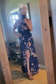 I love this dress!  I bought it specifically to wear to a Derby event.  I initially ordered a medium and it fit fine, but I thought I would size up just because I would be up and down and moving a lot all day.  It was very comfortable and I did receive many compliments.   I would buy this dress again.  So happy with how beautiful it was. - Natoshia S.