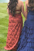 I love the color and pattern of this dress! However, when I received it, it was a little too long for me, and I worried about the open back and sides. Thankfully, my grandma and I were able to make some adjustments. For me, we hemmed the dress and used the extra fabric to create a tie in the back that would hold the sides of the dress closer to my body. Lulus, I think you should consider making a dress that has these adjustments! By doing that, I was able to wear a strapless bra, so I felt more comfortable the whole night. Overall, I love the dress and feel so beautiful in it! - Sofia B.