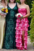 I loved this dress; the color was a true hot pink. Only concern with it was that the top rolling down a little bit wasn't too bad. Overall loved this dress. It was perfect got so many compliments. Front and back! - Lydia Y.