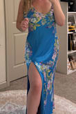 I want to love this dress--- it's a stunning color! The biggest and most obvious issue is that just as another reviewer said, the zipper immediately popped off when zipping up just while trying on. I sized up to an XL and the fit was roomy, so the zipper didn't require yanking of any kind... it just simply broke right off :( Secondly, it seems the floral pattern is placed differently on the dress I received than in the model photos, with mine having a large gap of blank blue space across the stomach, which wasn't disclosed as a possibility anywhere in the product info. That's not the biggest deal, but I really preferred the pattern depicted in the site's pictures.

I'm hopeful that Lulu's will replace the dress and ensure a higher quality, because I really do love it! - Blake B.