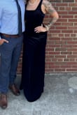 This dress was so cute! It was stretchy and soft! A little long on me, but I wore heels with it. When I took the heels off, it wasn't too long where I would trip on it. It was stretchy in the stomach area which I really liked. - Heather S.