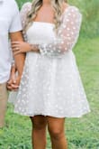 Used this dress for my engagement photos! It was super cute. Very flowy, not stretchy at all. - Heather S.