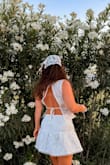 I love how versatile this top is. You can truly pair it with anything for a more elevated look! It's the perfect summer top with the back being open & breezy! - Delaney Z.