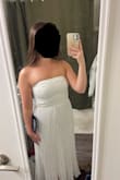 I think this dress is beautiful, but it just wasn't made for my body type. I'm 5'0, 120lbs with a short torso, and the design ended up making me look shorter and a bit stockier than expected. It technically would've fit perfectly, but there's a thick seam between the bodice and skirt that causes the zipper to catch and get stuck. Otherwise, the dress is stunning. Just wish it worked better for me. - Brianna V.