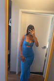 Loved this dress. The blue color is stunning and looks really pretty with silver jewelry. This felt sexy yet elegant. The material was nice and breathable. Great for a wedding. - Paris T.