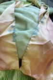 The top of this dress looks nothing like the photos. Looks like I accidentally got ink on the small blue portion, and the pink portion looks like it was just thrown on. Can't exchange due to being out of stock in size. Highly unfortunate. Nothing in the description says it may vary, btw. - Allie P.