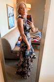 I stumbled upon this dress when I was searching for a black tie wedding. The reviews were good. I purchased my usual size small. I could go on for days about this dress. It is perfectly made and actually so comfortable. I felt like a princess. The cut, the weight of the dress, and where the slit is located. It was perfect. I received so many compliments. Didn't even want to take it off at the end of the night. It's even more beautiful in person. - Mary E.